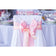 chair covers with pink sash